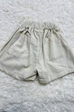 Beige cotton girls short w/black button 230121M