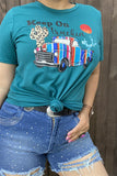 DLH9121-1 "KEEP ON TRUCKIN"multi color printed graphic teal background fabric short sleeve women tops