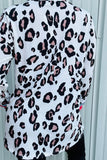 XCH14274 WHITE LEOPARD LONG SLEEVE TOP W/ CORAL CUFF