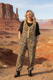 Person wearing a leopard print jumpsuit