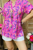 GJQ15843 Yellow floral multi color printed short sleeve V-neckline women tops w/side slits
