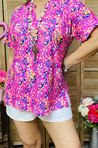 GJQ15843 Yellow floral multi color printed short sleeve V-neckline women tops w/side slits